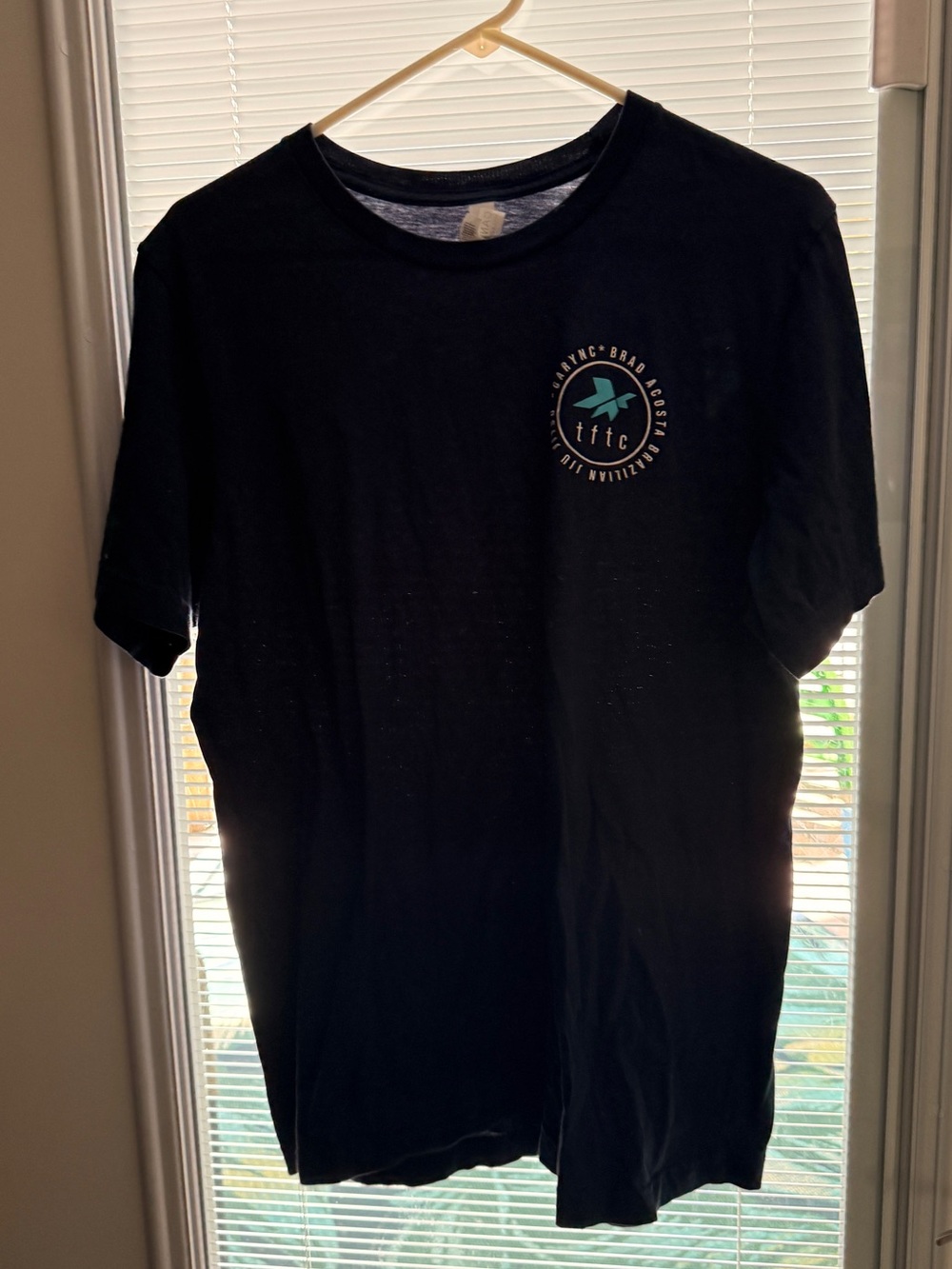 Bella Canvas Black Short Sleeve Tee with Small Teal Logo